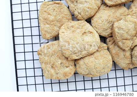 Textured soy protein on cooling rack 116946780