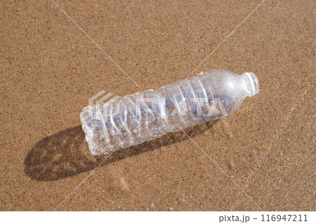 Plastic bottle on the beach 116947211