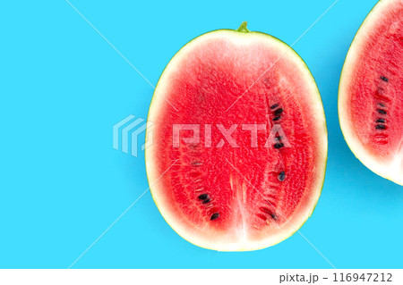 Fresh watermelon on blue background. 116947212