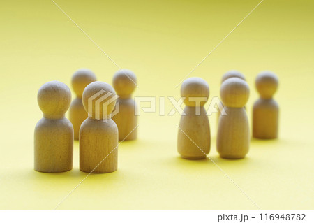 Wooden figure with put into respective groups for discussion. Copy space concept 116948782