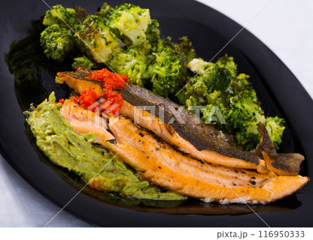 Exquisitely served fillet of trout 116950333