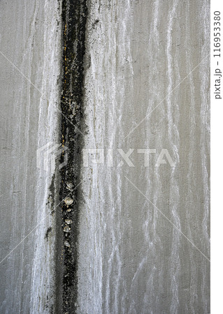 A wall with a white line and a black line A wall with a white line and a black line 116953380