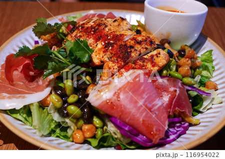 Roast chicken with prosciutto, Edamame, vegetable and dipping sauce 116954022