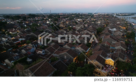 the lantern boats on the canal in hoi a night market in vietnam.the old town was a Southeast Asian trading port from the 15 to 19th century, now it become the resort city 116959751