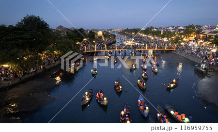 the lantern boats on the canal in hoi a night market in vietnam.the old town was a Southeast Asian trading port from the 15 to 19th century, now it become the resort city 116959755