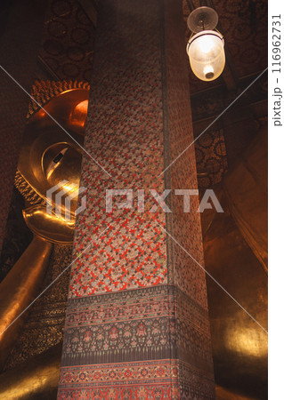 asia travel concept with golden buddha statue and old interior architecture at thailand temple 116962731