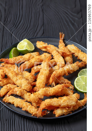 deep fried panko breaded shrimp on a plate deep fried panko breaded shrimp on a plate 116963769