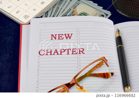 Text sign showing the NEW CHAPTER strategic inscription, explanation, conceptual idea in a composition with motivating elements of banknotes 116966682
