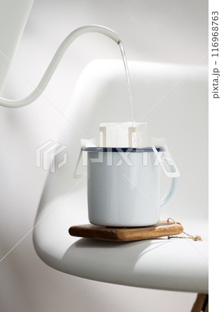 Drip Bag brews Coffee meticulously. 116968763