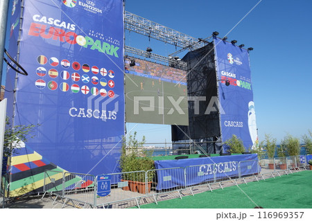 People watching the Netherlands vs. Romania Uefa European Championship game in the Euro Park fan zone, Cascais, Portugal 116969357