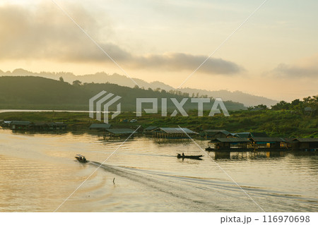 Long tail boat in the lake on the river in Sangkhla Buri Long tail boat in the lake on the river in Sangkhla Buri 116970698