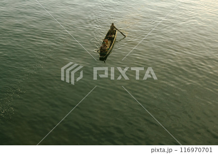 Long tail boat in the lake on the river in Sangkhla Buri Long tail boat in the lake on the river in Sangkhla Buri 116970701