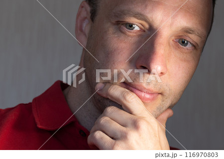 Face portrait of positive young adult Caucasian man, close up Face portrait of positive young adult Caucasian man, close up 116970803