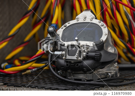 Closeup photo of commercial diving helmet 116970980