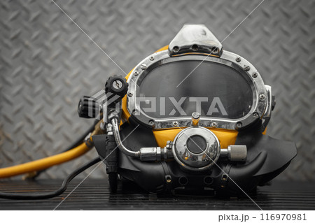Closeup photo of commercial diving helmet 116970981