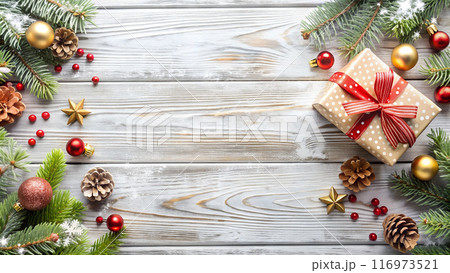 Christmas wooden background with copyspace, decorated with Christmas tree and gifts 116973521