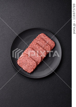 Delicious canned pink ham with salt, spices and herbs 116973789