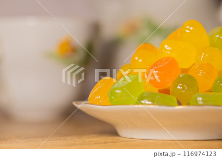 Colorful hard candy on a saucer 116974123