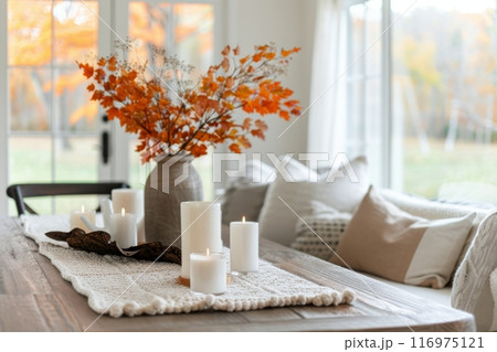 Fall Table Setting With Candles and Maple Leaves 116975121