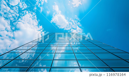 青空に伸びる近代的な高層ビルを下から見上げるアングルでリアルに描いたAI生成画像 116978164