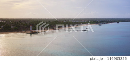 Drone shot of Bayahibe beach panorama of shore and clear crystal sea at sunrise 116985226