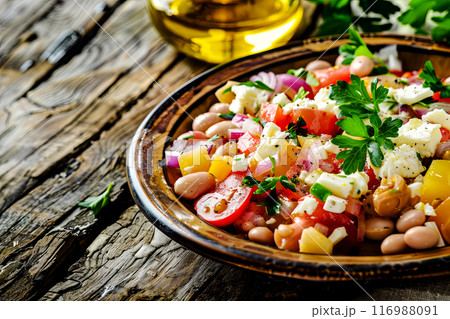 Close-up on traditional Turkish Piyaz salad consisting of eggs, beans, tahina, tomatoes, onions, herbs and olives, poster for cafe menu Close-up on traditional Turkish Piyaz salad consisting of eggs, beans, tahina, tomatoes, onions, herbs and olives, poster for cafe menu 116988091