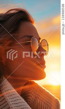 Vertical portrait of a woman in the sun, a tourist traveling through the desert Vertical portrait of a woman in the sun, a tourist traveling through the desert 116988586