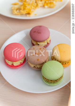 Delicious breakfast with oatmeal and macaroons. 116988897