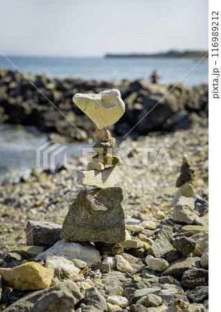 Balanced Zen stones, sea beach, pyramid. Life Balance. Balancing Mind, Soul and Spirit. Mental Meditation Practice Balanced Zen stones, sea beach, pyramid. Life Balance. Balancing Mind, Soul and Spirit. Mental Meditation Practice 116989212