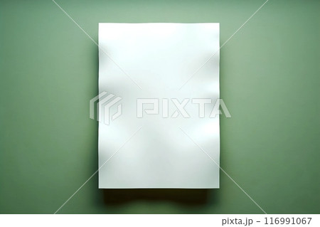Empty white paper sheet isolated on green background 116991067