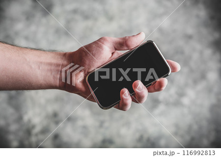 Smart cell phone in hand 116992813