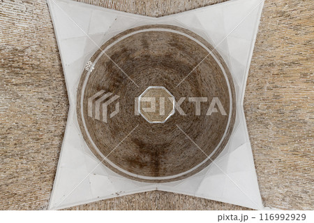 Ancient brick dome with white design elements, bottom view Ancient brick dome with white design elements, bottom view 116992929