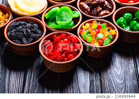 Group of dried and candied fruit in bowl Group of dried and candied fruit in bowl 116993644