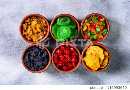 Group of dried and candied fruit in bowl Group of dried and candied fruit in bowl 116993650