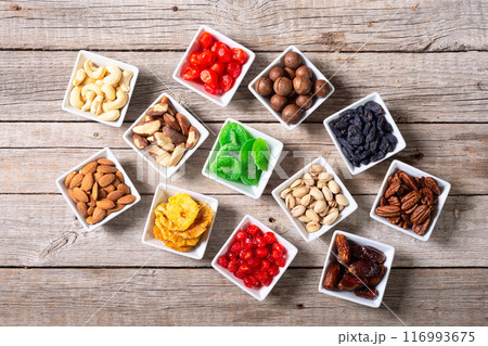 Mix of dried and candied fruits and nuts 116993675