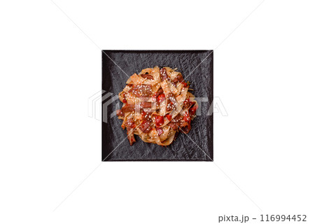 Delicious asian udon dish with vegetables, meat, salt and spices 116994452