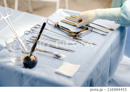 Medical instruments for surgery on table 116994455