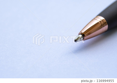 Close up of pen on white paper with customizable space for text or ideas. Copy space concept Close up of pen on white paper with customizable space for text or ideas. Copy space concept 116994955