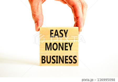 Easy money business symbol. Concept words Easy money business on beautiful wooden blocks. Beautiful white table white background. Businessman hand. Easy money business concept. Copy space. 116995098