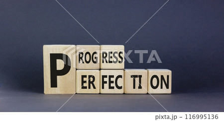 Progress or perfection symbol. Concept word Progress Perfection on beautiful wooden cubes. Beautiful black background. Business progress or perfection concept. Copy space. Progress or perfection symbol. Concept word Progress Perfection on beautiful wooden cubes. Beautiful black background. Business progress or perfection concept. Copy space. 116995136