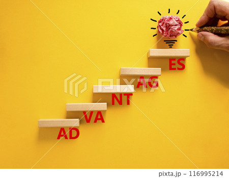 Advantages symbol. Concept word Advantages on beautiful wooden blocks. Beautiful yellow background. Businessman hand. Beautiful light bulb icon. Business advantages concept. Copy space. Advantages symbol. Concept word Advantages on beautiful wooden blocks. Beautiful yellow background. Businessman hand. Beautiful light bulb icon. Business advantages concept. Copy space. 116995214