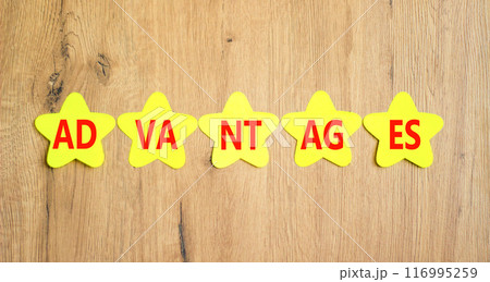 Advantages symbol. Concept word Advantages on beautiful yellow paper stars. Beautiful wooden background. Business advantages concept. Copy space. Advantages symbol. Concept word Advantages on beautiful yellow paper stars. Beautiful wooden background. Business advantages concept. Copy space. 116995259