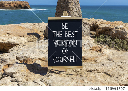 Motivational inspirational symbol. Concept words Be the best version of yourself on beautiful black chalkboard. Beautiful stone sea background. Business motivational inspirational concept. Copy space. Motivational inspirational symbol. Concept words Be the best version of yourself on beautiful black chalkboard. Beautiful stone sea background. Business motivational inspirational concept. Copy space. 116995297