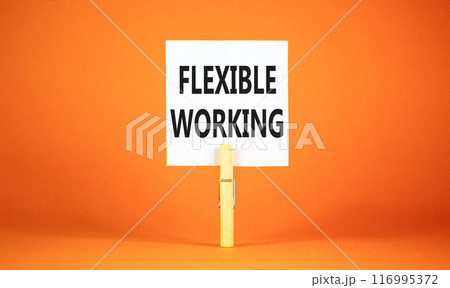 Flexible working symbol. Concept words Flexible working on beautiful white paper on wooden clothespin. Beautiful orange background. Business flexible working concept. Copy space. 116995372