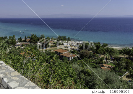 Greece, Afytos, Elevated view of Afitos beach. 116996105