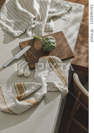 Assortment of fresh vegetables, linen towels and stainless still kitchen appliances. Healthy food cooking ingredients background with fresh vegetables Assortment of fresh vegetables, linen towels and stainless still kitchen appliances. Healthy food cooking ingredients background with fresh vegetables 116996393