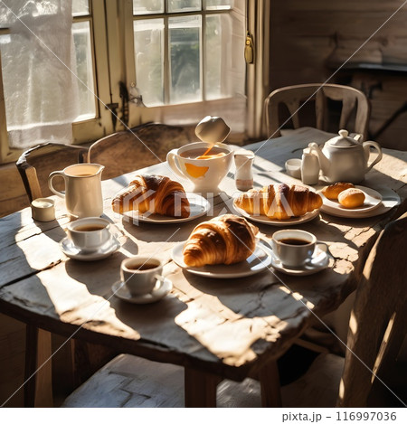 Sunlit Kitchen Table with Breakfast Items Sunlit Kitchen Table with Breakfast Items 116997036