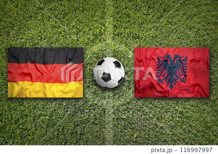 Germany vs. Albania flags on soccer field Germany vs. Albania flags on soccer field 116997997