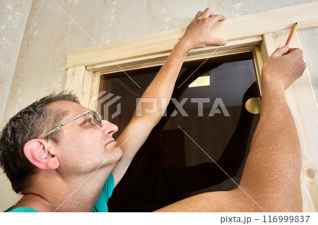 Door casing trimming, marking before installing casings. Door casing trimming, marking before installing casings. 116999837