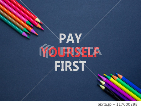 Pay yourself first symbol. Concept words Pay yourself first on beautiful black paper. Beautiful black table black background. Colored pencils. Business and pay yourself first concept. Copy space. Pay yourself first symbol. Concept words Pay yourself first on beautiful black paper. Beautiful black table black background. Colored pencils. Business and pay yourself first concept. Copy space. 117000298